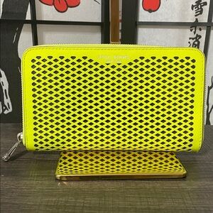 Henri Bendel Rare Neon Yellow and Black Perforated Zip Wallet with Silver Logo